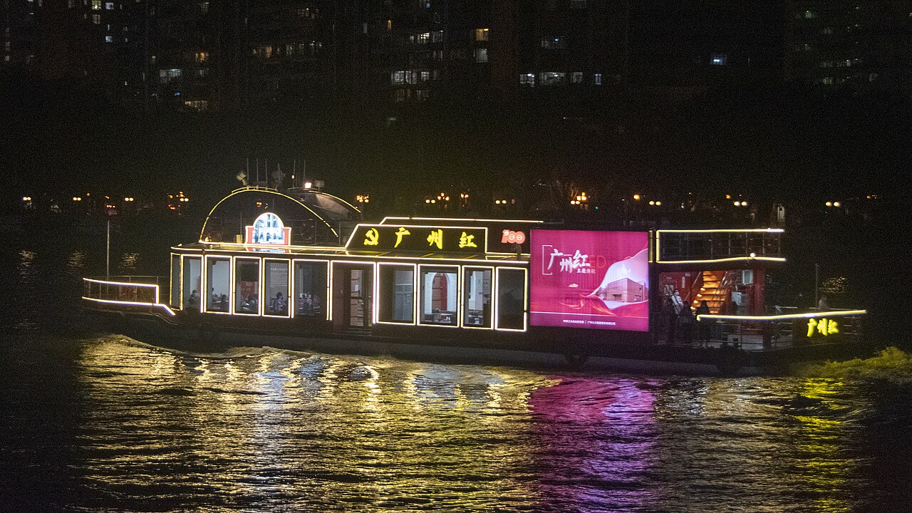 Guangzhou Red sightseeing boat illuminated on the Pearl River at night