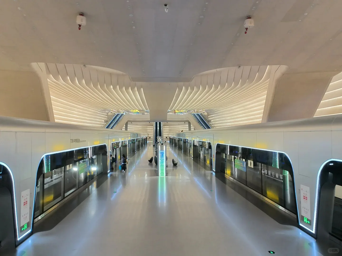 Symmetrical transit hall inside Chongqing Jiangbei International Airport
