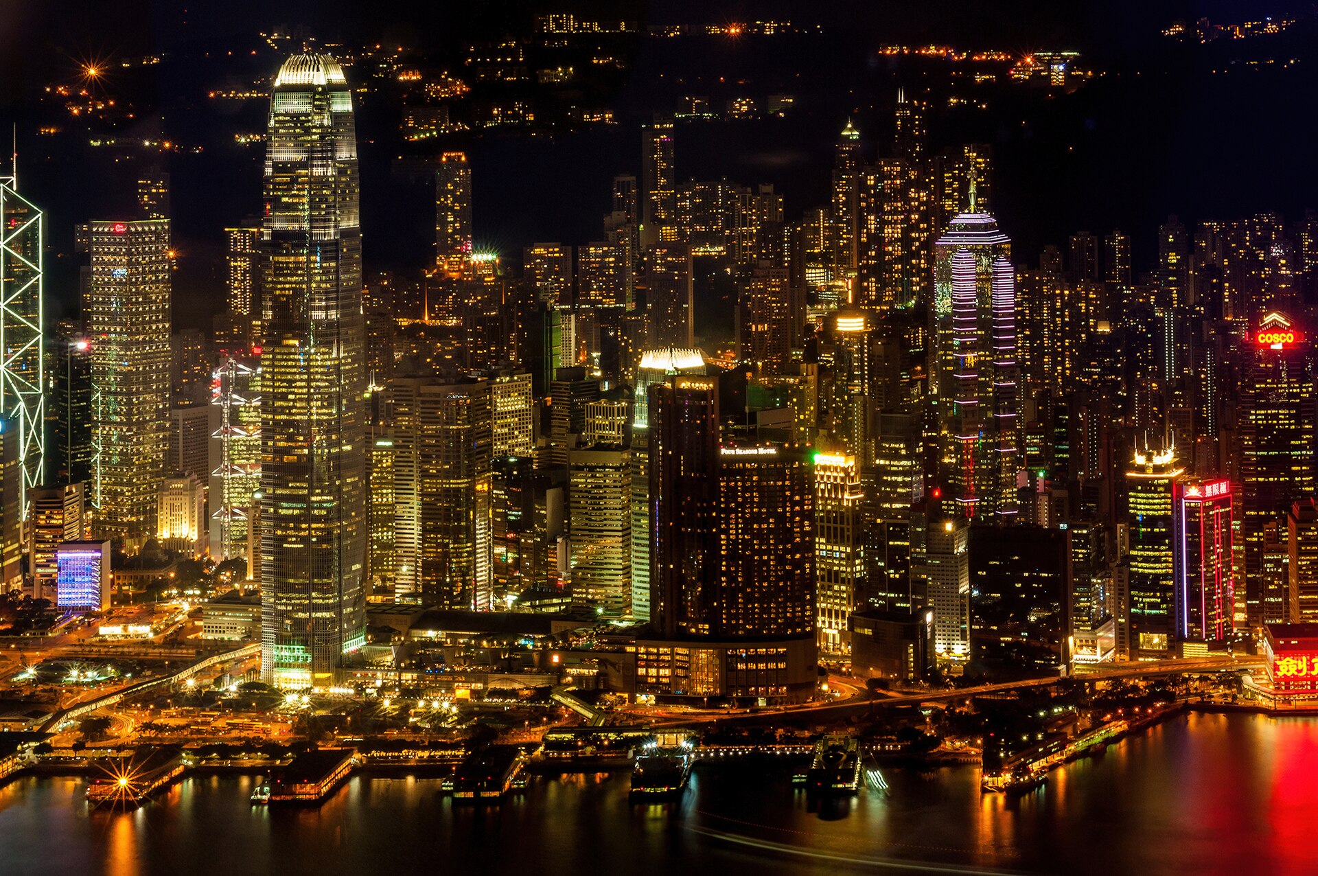Hong Kong Island skyline above Victoria Harbour at night