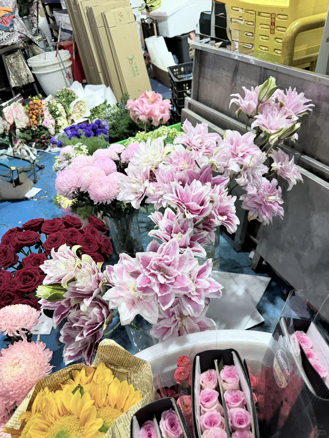 Buckets of colorful cut flowers at Dounan Flower Market in Kunming