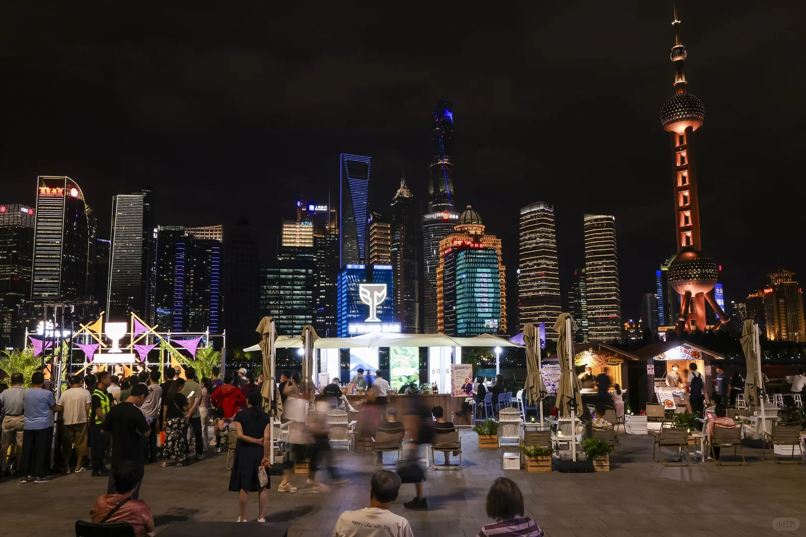 Night market beside Shanghai's North Bund with the Lujiazui skyline beyond