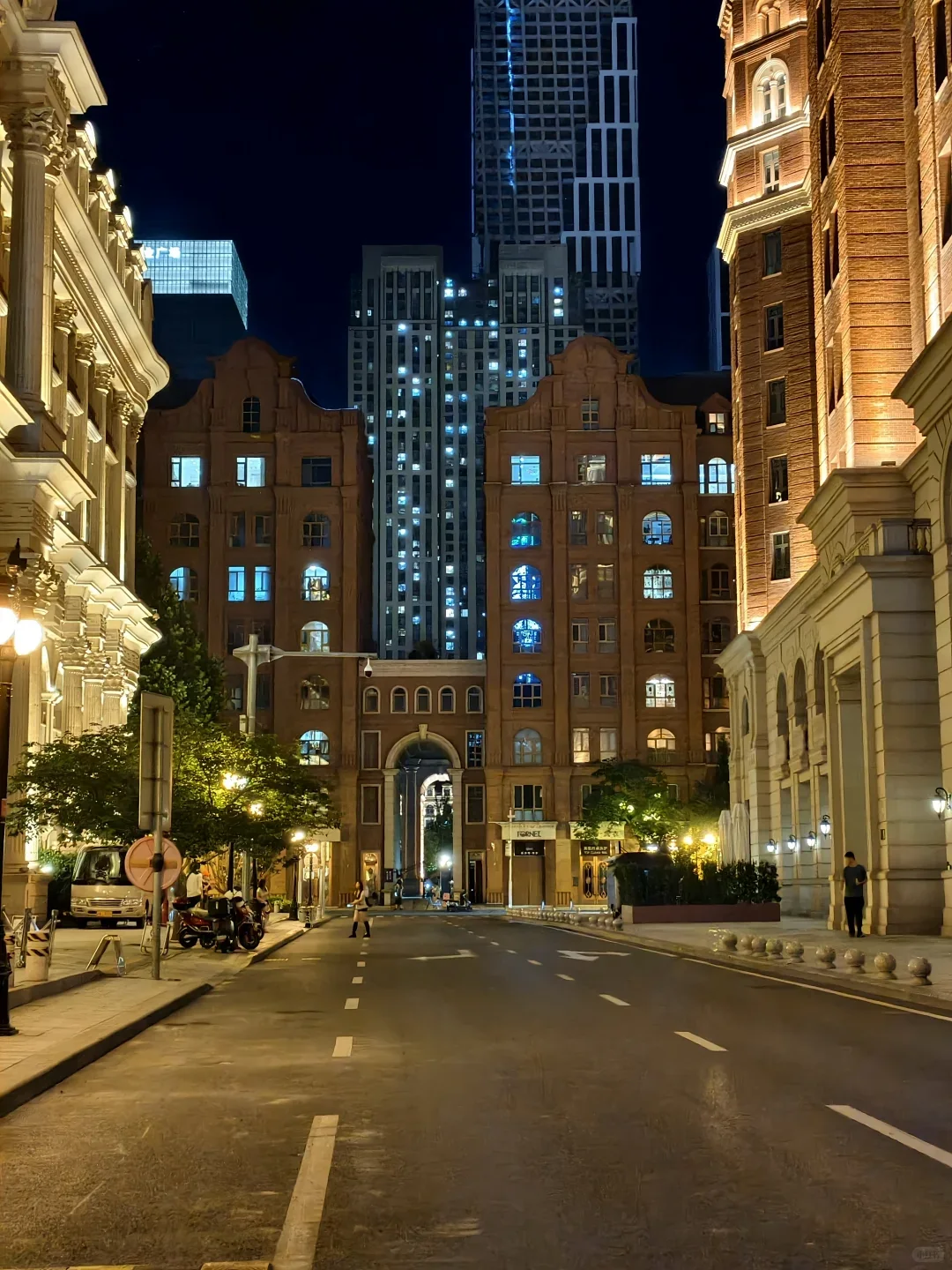 Illuminated historic building on a quiet street in Tianjin's Five Great Avenues