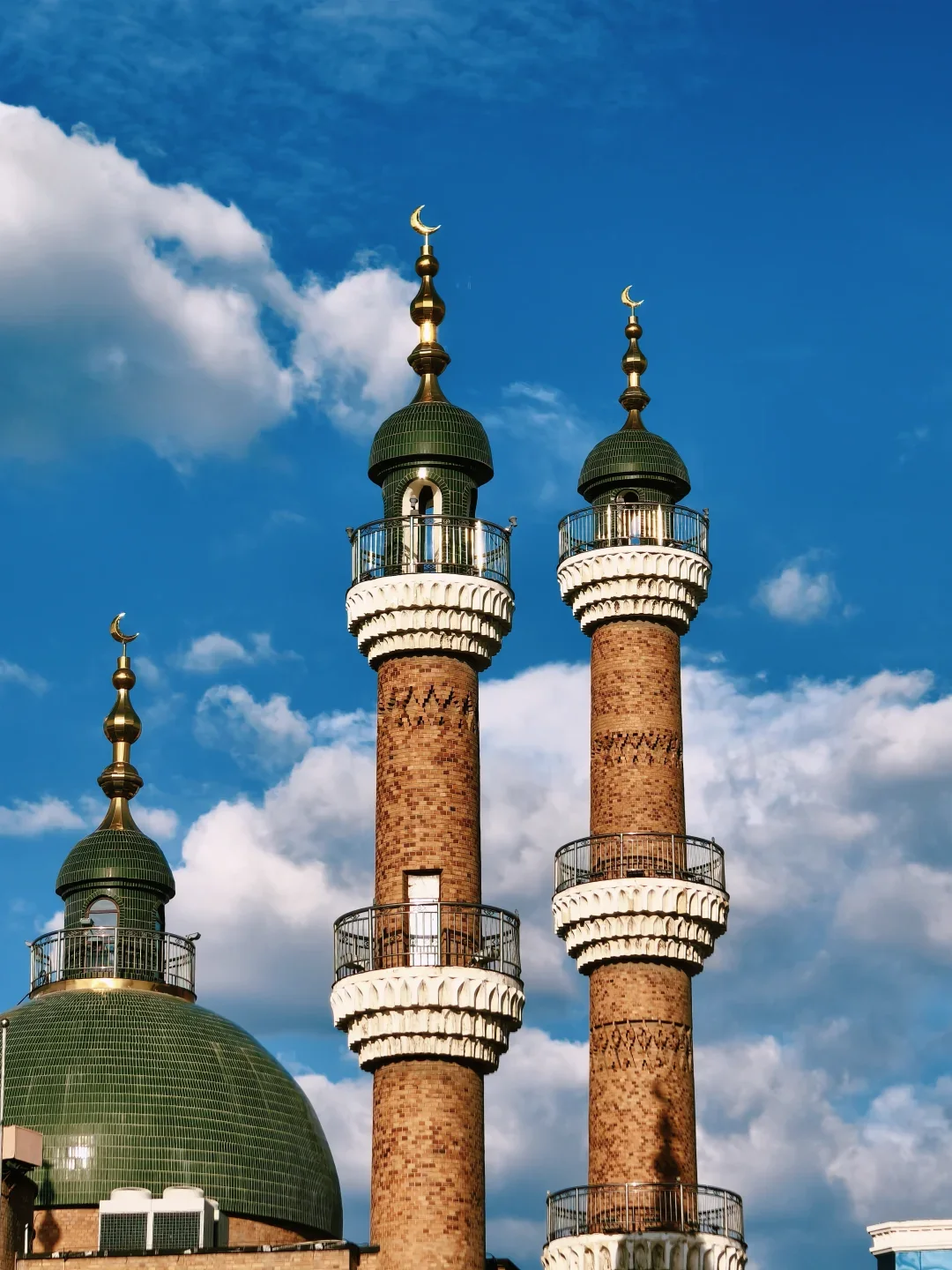 Brick towers and green domes at the International Grand Bazaar in Urumqi